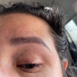 Pro Threading & Beauty - The middle part is just sticking straight up.