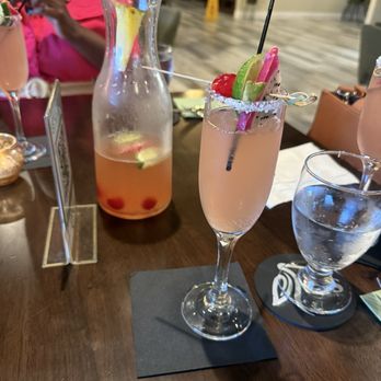 Ibis Cuisine - Tropical fruit Mimosa carafe - Caribbean Near Me - Virginia Beach, Virginia