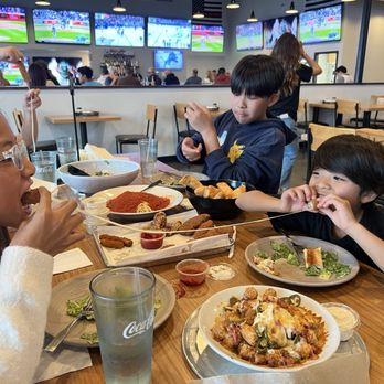 Tony Pepperoni Pizzeria - Kids are enjoying their mozzarella sticks. Lady and the Tramp style. - Pizza Near Me - Oceanside, California