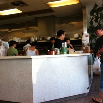 Sunrise Kitchen - Picking up delicious broccoli over steamed rice. - Chinese Near Me - Fresno, California Sunrise Kitchen - Picking up delicious broccoli over steamed rice. - Chinese Near Me - Fresno, California