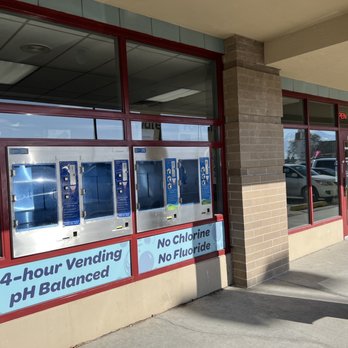 Water for Life - a woman walking past a pharmacy - Water Stores Near Me - Riverton, Utah Water for Life - a woman walking past a pharmacy - Water Stores Near Me - Riverton, Utah