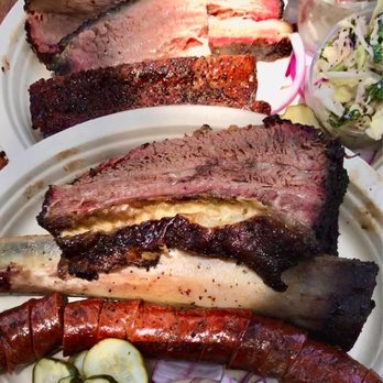 Micklethwait Craft Meats - Brisket (top) Ribs, Beef Rib, Hot Link, Homemade Pickles. Delicious but served nearly room temperature :/ - Food Trucks Near Me - Austin, Texas Micklethwait Craft Meats - Brisket (top) Ribs, Beef Rib, Hot Link, Homemade Pickles. Delicious but served nearly room temperature :/ - Food Trucks Near Me - Austin, Texas