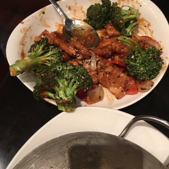 P.F. Chang's - Sesame Chicken..See the confusing raw broccoli?  my son liked the chicken tho - Asian Fusion Near Me - Bakersfield, California