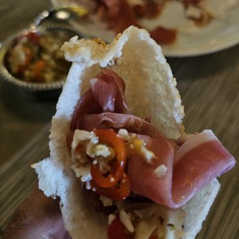Giovedi - Break open a Vietnamese Sesame Donut and fill with prosciutto and pickles... yummy! - Asian Fusion Near Me - Honolulu, Hawaii