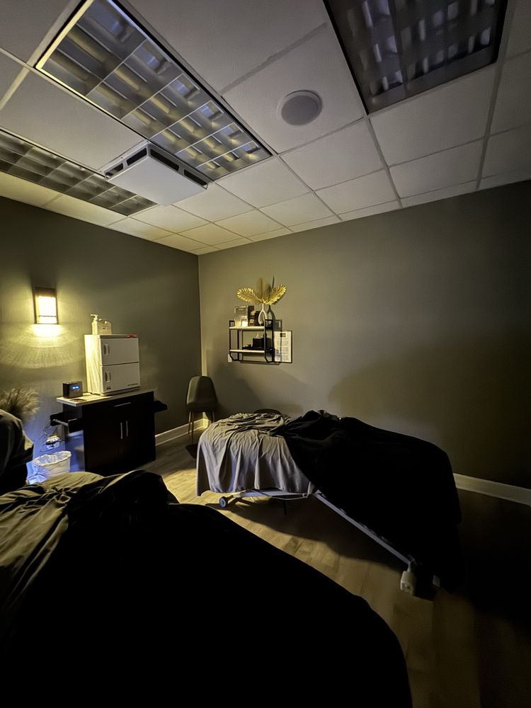 Signature Massage and Facial Spa of Trinity Logo