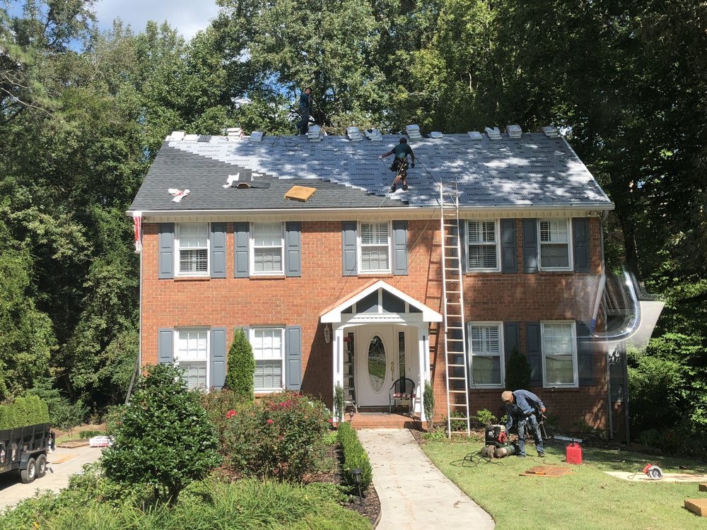 Slide of Noland Roofing