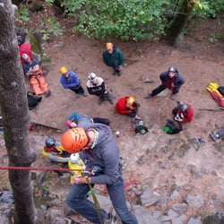 Smith Rock Climbing School - A guide instructing self-rescue skills to a local climbing club.