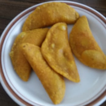 Garifuna Flava - Panadas with cabbage sauce - Caribbean Near Me - Chicago, Illinois