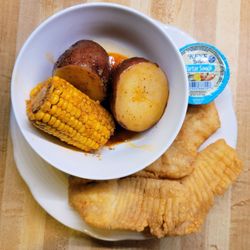 Cajun Seafood Wings & Fish - Marietta - Ala carte - Tilapia with side of corn (instead of 3 half ears of corn / 2 potato halves)
