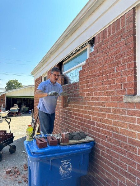 Slide of Gus The Handyman