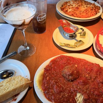 Dominicks Italian Restaurant - Half & Half Combo with Spaghetti & Marinara Sauce and meat Ravioli; baked penne pasta with chicken; Garlic Bread. - Italian Near Me - Oxnard, California Dominicks Italian Restaurant - Half & Half Combo with Spaghetti & Marinara Sauce and meat Ravioli; baked penne pasta with chicken; Garlic Bread. - Italian Near Me - Oxnard, California