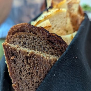 Chez Bacchus - The bread selection is fantastic. If you're a garlic lover like myself, ask for the roasted garlic pairing. - New American Near Me - Long Beach, California