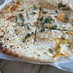 Karma Kitchen - Best cheese and garlic naan I've ever had. Bar none.