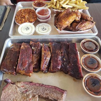 GQue BBQ Lone Tree - Pork ribs , brisket, baked beans, fries, and chicken wings - Barbeque Near Me - Lone Tree, Colorado GQue BBQ Lone Tree - Pork ribs , brisket, baked beans, fries, and chicken wings - Barbeque Near Me - Lone Tree, Colorado