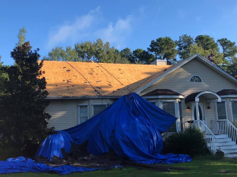 Slide of Hixon's Roofing