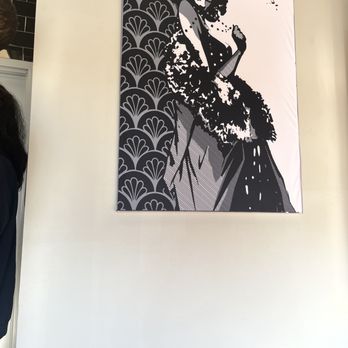 Godfathers Pizza - a woman in a black and white dress - Pizza Near Me - Charlotte, North Carolina Godfathers Pizza - a woman in a black and white dress - Pizza Near Me - Charlotte, North Carolina