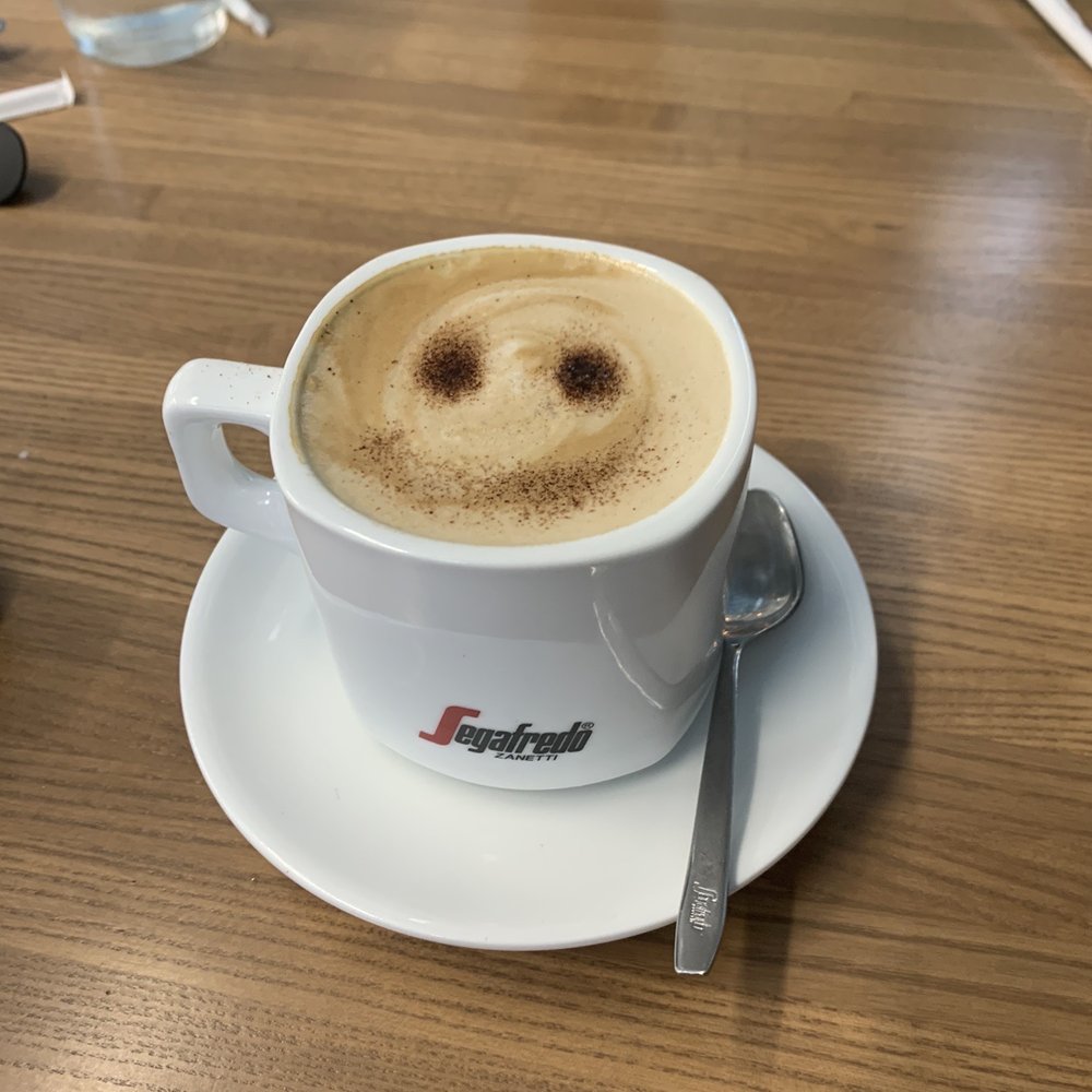 Flips Pancake House - Cappuccino with a smiley face - Burgers Near Me - Bettendorf, Iowa Flips Pancake House - Cappuccino with a smiley face - Burgers Near Me - Bettendorf, Iowa