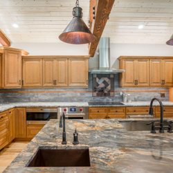 Kona Cabinetry & Design - This is from our Builder Pro collection and features granite with slate back splash.