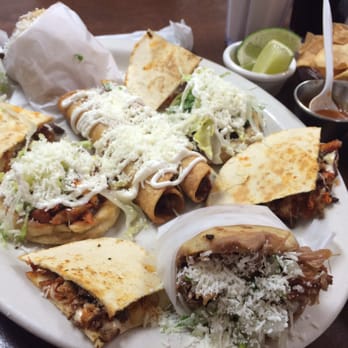Mi Rinconcito Mexicano - A combination of nacho, sope, taco and quesadilla because we couldn't decide what to eat.. - Tacos Near Me - Miami, Florida Mi Rinconcito Mexicano - A combination of nacho, sope, taco and quesadilla because we couldn't decide what to eat.. - Tacos Near Me - Miami, Florida