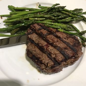 Camas - a steak and asparagus on a plate - New American Near Me - Omak, Washington Camas - a steak and asparagus on a plate - New American Near Me - Omak, Washington