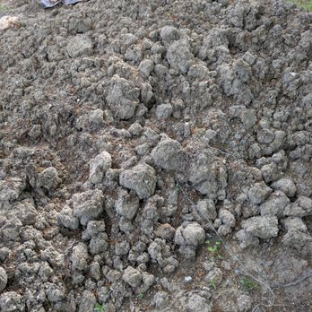 Forever Green Landscaping - Piles of clay balls, not topsoil we ordered. - Landscaping Near Me - Lebanon, Missouri Forever Green Landscaping - Piles of clay balls, not topsoil we ordered. - Landscaping Near Me - Lebanon, Missouri