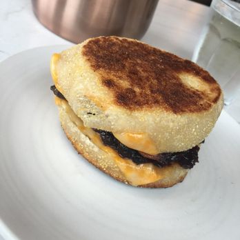 The Lynhall Minneapolis Private Event Venue - Breakfast sandwich on English muffin with pork belly - Breakfast & Brunch Near Me - Minneapolis, Minnesota The Lynhall Minneapolis Private Event Venue - Breakfast sandwich on English muffin with pork belly - Breakfast & Brunch Near Me - Minneapolis, Minnesota