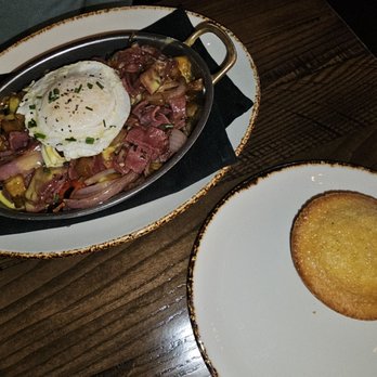 Haywire - Wagyu corn beef hash with a side of homemade cornbread - New American Near Me - Houston, Texas Haywire - Wagyu corn beef hash with a side of homemade cornbread - New American Near Me - Houston, Texas