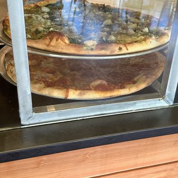 Vics Pizza - Pizza by the slice. When we were here, there were six pies they were in the rotation. - Pizza Near Me - Olympia, Washington Vics Pizza - Pizza by the slice. When we were here, there were six pies they were in the rotation. - Pizza Near Me - Olympia, Washington