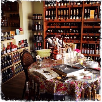 Varietals and More - a table with wine bottles - Cheese Shops Near Me - Vero Beach, Florida Varietals and More - a table with wine bottles - Cheese Shops Near Me - Vero Beach, Florida
