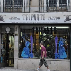 Triparte Body Piercing Tattoo