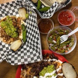 Micro Bowl, Chicken Taco, Burrito El Rey, and their Mango Habanero Wings Micro Bowl, Chicken Taco, Burrito El Rey, and their Mango Habanero Wings
