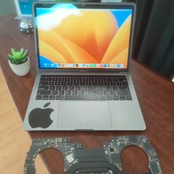 Hi-Tek Solutions - Here is a MacBook that wouldn't power on. We replaced it's logic board and now it's like new!