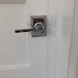 Sterling Locksmiths - Schlage "Latitude" entry lever set with "Addison" trim installed on a closet door.