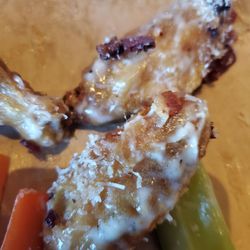 The Dogwood Bar - Bacon parmesan ranch wings !!! It comes with veggies & buttermilk ranch dip. Soooo excellent!