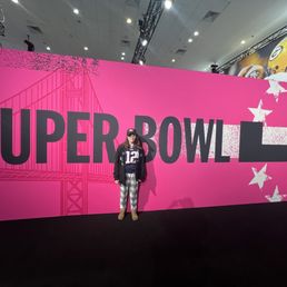 Super Bowl Experience Back drop with my daughter posing