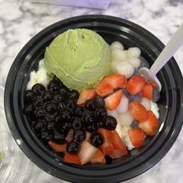 Creamy Snowflake Bowl (green tea ice cream, strawberries, momoko balls, boba) Creamy Snowflake Bowl (green tea ice cream, strawberries, momoko balls, boba)