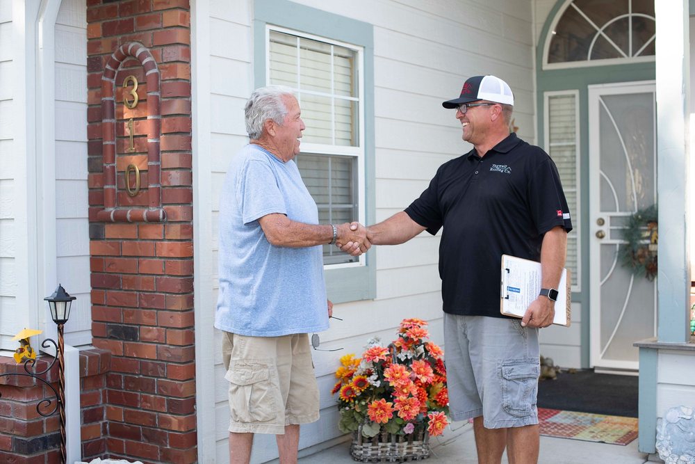 Slide of Tugwell Roofing