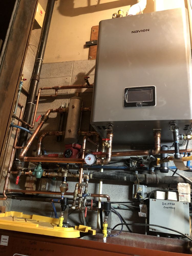 Slide of TC Plumbing & Heating