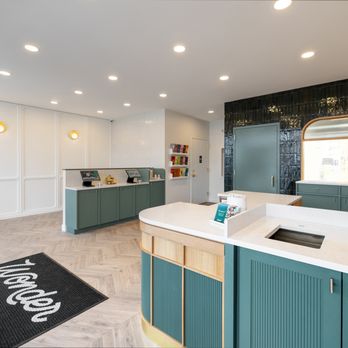 Wonder Springfield - a kitchen with blue cabinets and white countertops - Food Delivery Services Near Me - Springfield, New Jersey