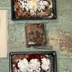 Mon Amies Carbbean Flava Ice - Strawberry, and chocolate waffles with whipped cream on top , powdered sugar and condensed milk these are all gluten free as well !!