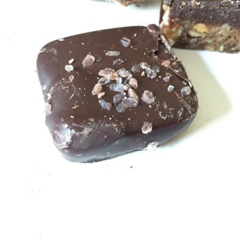 Divine Treasures - Caramel cashew (caramel with whole cashews covered in chocolate topped w sea salt) - Vegan Near Me - Manchester, Connecticut Divine Treasures - Caramel cashew (caramel with whole cashews covered in chocolate topped w sea salt) - Vegan Near Me - Manchester, Connecticut