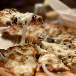 Olympia Pizza & Pasta - Meat Lovers added black olives and onions. 4/5 stars