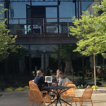 Good Coworking - Sunny central courtyard (has hammock and umbrellas as well!) - Shared Office Spaces Near Me - Dallas, Texas