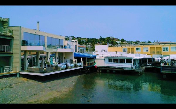 Photo of Luna Blu - Tiburon, CA, US. Our original deck under the blue awning and our deck extension on the left.