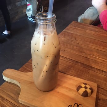 Ella Cafe - Iced Latte w/ Almond Milk and Hazelnut Ella flavor. I didn't eat the cookie :( - Coffee & Tea Near Me - Plantation, Florida Ella Cafe - Iced Latte w/ Almond Milk and Hazelnut Ella flavor. I didn't eat the cookie :( - Coffee & Tea Near Me - Plantation, Florida