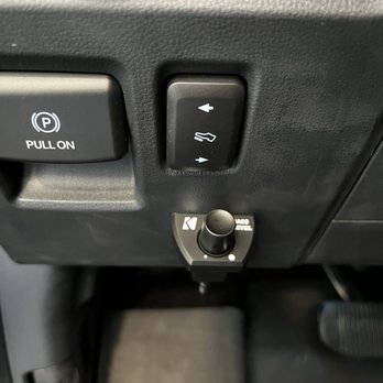 Mobile Wiring Plus - A dial by the driver's left knee to control bass in songs - Car Stereo Installation Near Me