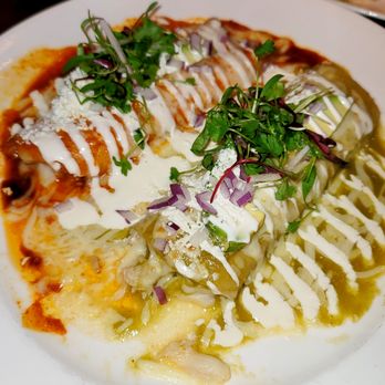 Javier's - Enchiladas de Cangrejo - dungeness crab enchiladas with a custom request of both red & green sauce.  Comes with a side of rice & beans. - Mexican Near Me - Irvine, California