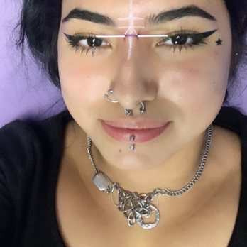 Bayou City Tattoos - getting my bridge pierced - Tattoo Near Me - Houston, Texas