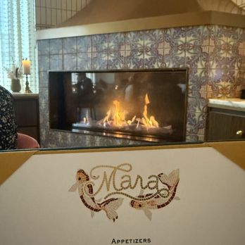 Mara - Menu and fireplace ambience - Mediterranean Near Me - Minneapolis, Minnesota