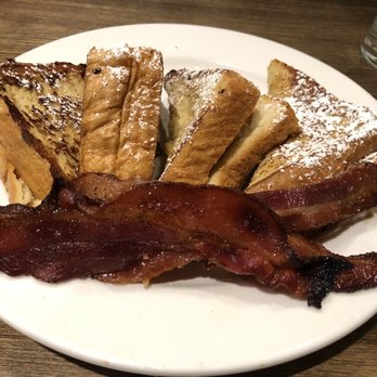 Famous Toastery - Stuffed French Toast with Peanut Butter and Banana - Breakfast & Brunch Near Me - Charlotte, North Carolina Famous Toastery - Stuffed French Toast with Peanut Butter and Banana - Breakfast & Brunch Near Me - Charlotte, North Carolina